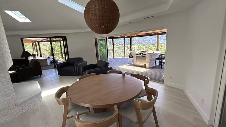 Cliff House dining room with deck and valley views