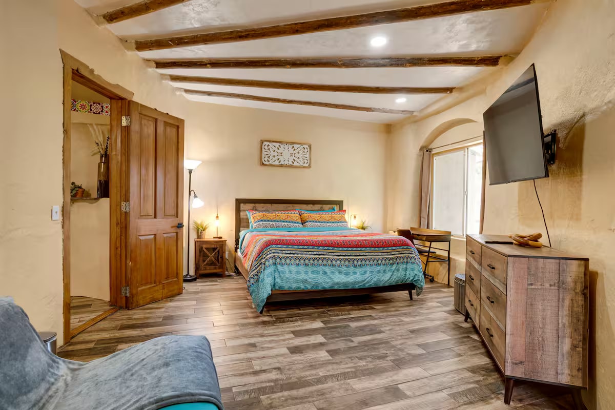 Hobbit House bedroom with handcrafted rounded walls